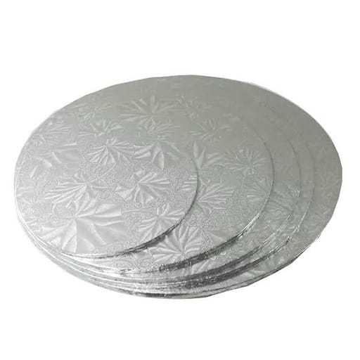 Silver Masonite Round Cake Boards featuring a shiny, embossed surface, perfect for cake presentation.