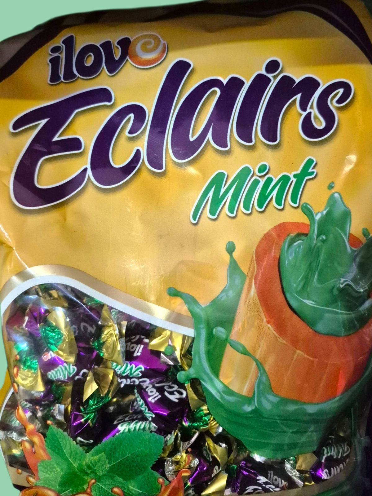 SY DISCOUNT WAREHOUSE I Love Eclairs Mint toffees in an 800g bag with purple, gold, and green individual wrappers.