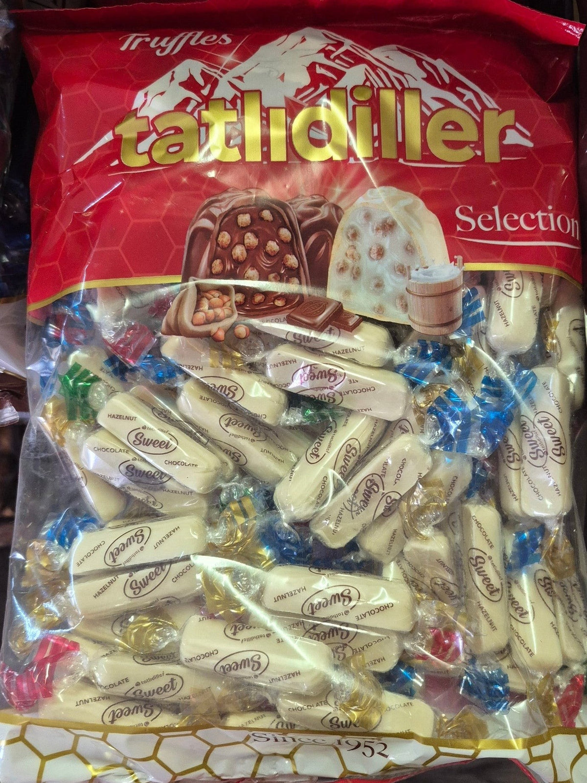 SY DISCOUNT WAREHOUSE Tatlidiller assorted chocolate truffles in a large clear bag with individually wrapped sweets